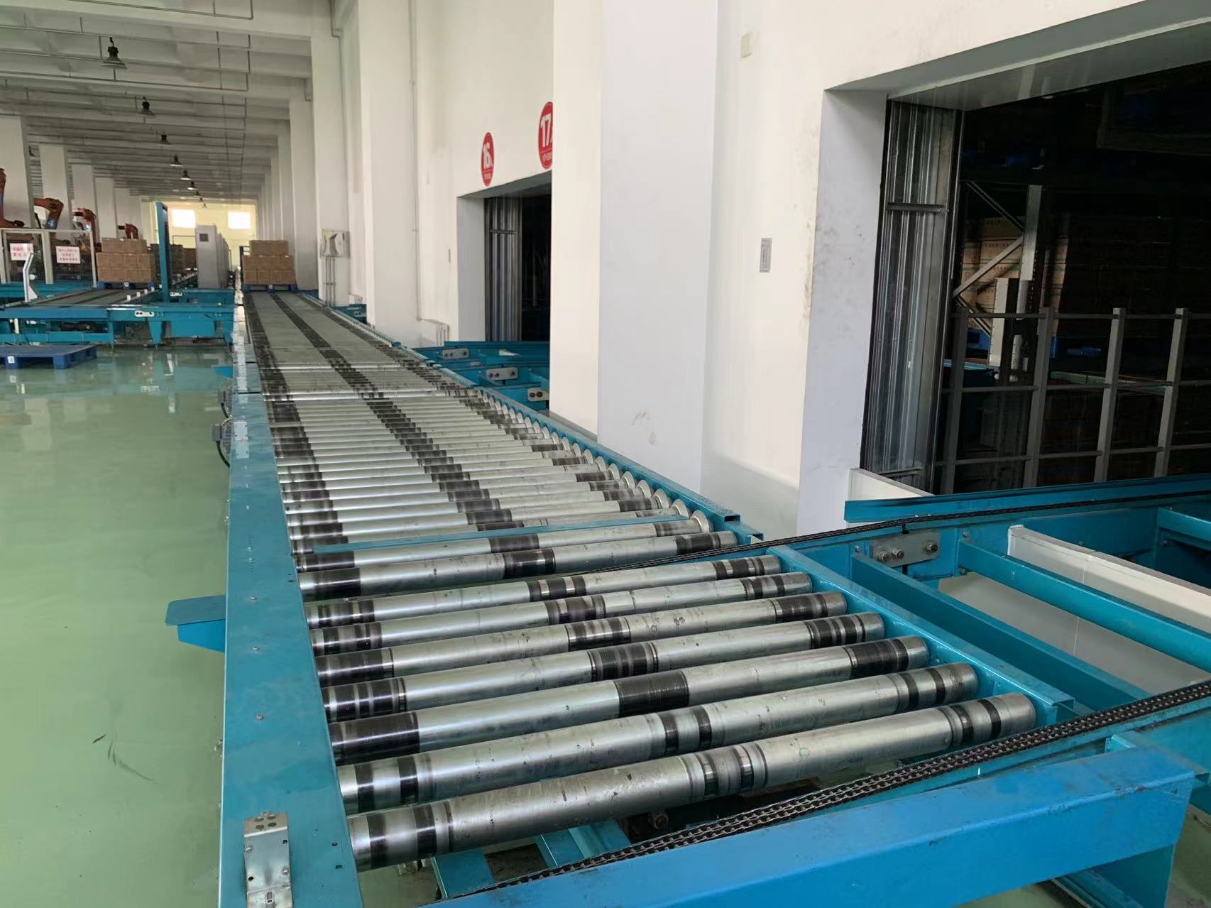 Hoogwaardige flexibele pallettransportrol met motor en zwaartekrachtaandrijving
